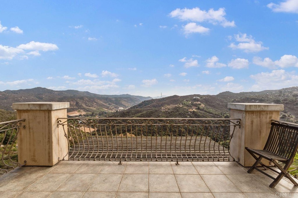 10363 Hidden Meadows Road Escondido, CA 92026 - Photo 32 of 65 a view of a terrace with a bench