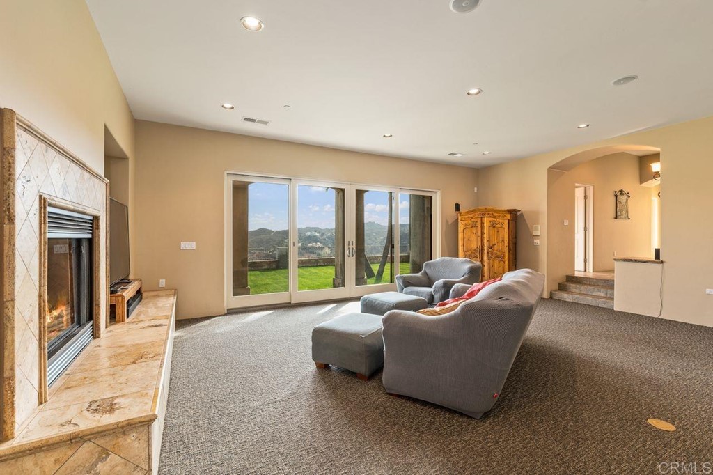 10363 Hidden Meadows Road Escondido, CA 92026 - Photo 39 of 65 a living room with furniture and a large window