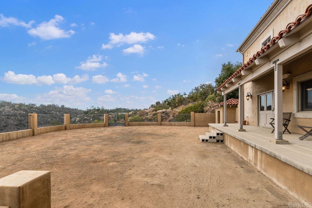 10363 Hidden Meadows Road Escondido, CA 92026 - Photo 52 of 65 a view of a lake with a house