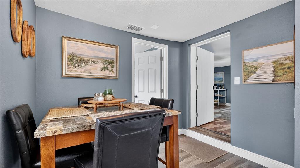 5411 Teal Drive Weeki Wachee, FL 34607 - Photo 20 of 44 a view of a workspace with furniture and a window