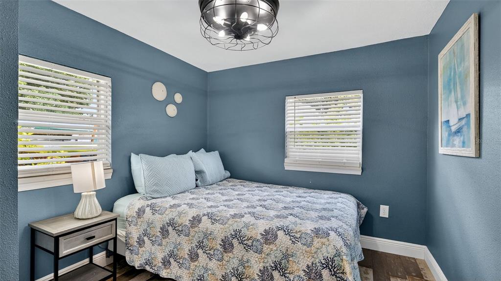 5411 Teal Drive Weeki Wachee, FL 34607 - Photo 24 of 44 a bedroom with a bed and a window