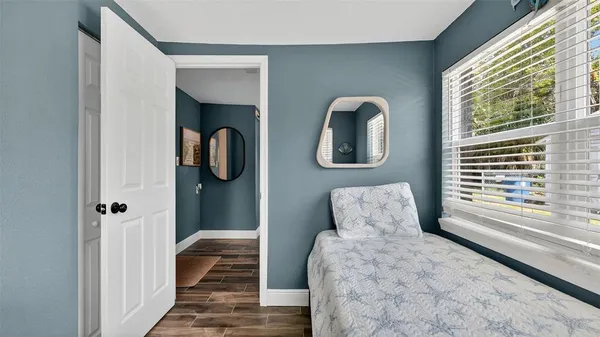 a bathroom with a toilet sink and shower