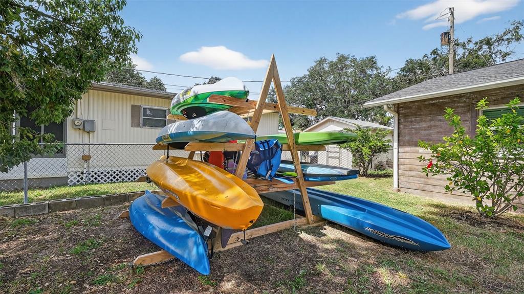 5411 Teal Drive Weeki Wachee, FL 34607 - Photo 32 of 44 swimming pool with outdoor seating