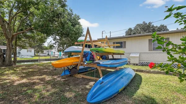 a bathroom with a sink a mirror and shower