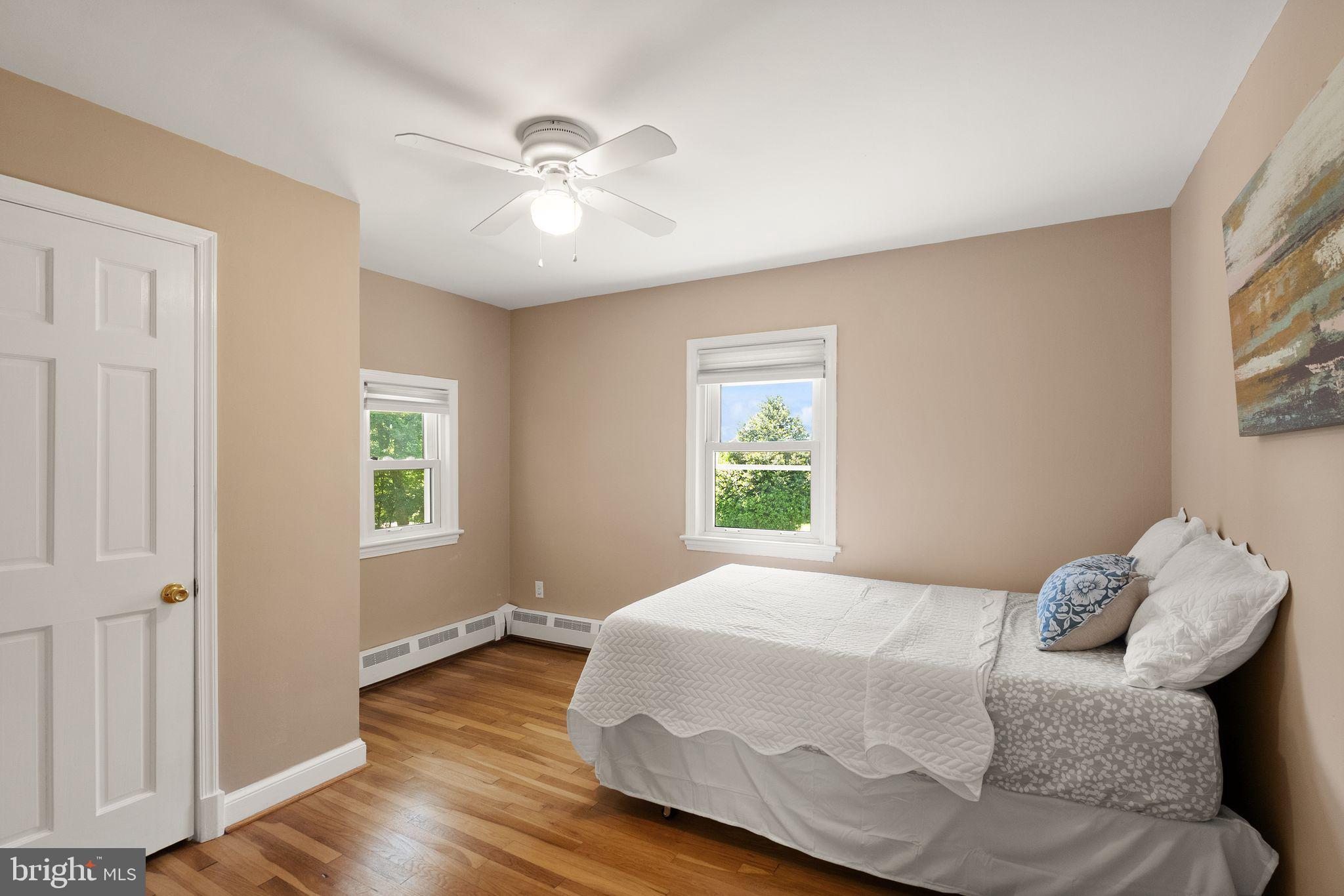 815 Seneca Road Great Falls, VA 22066 - Photo 35 of 61 a bedroom with a bed and a window