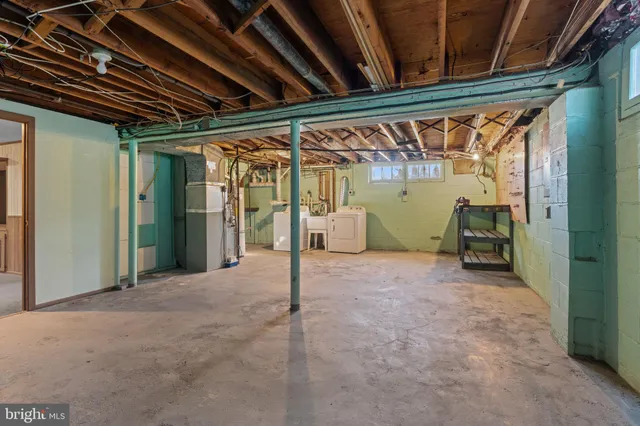 a view of a room with wooden walls