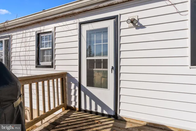a view of a balcony with door