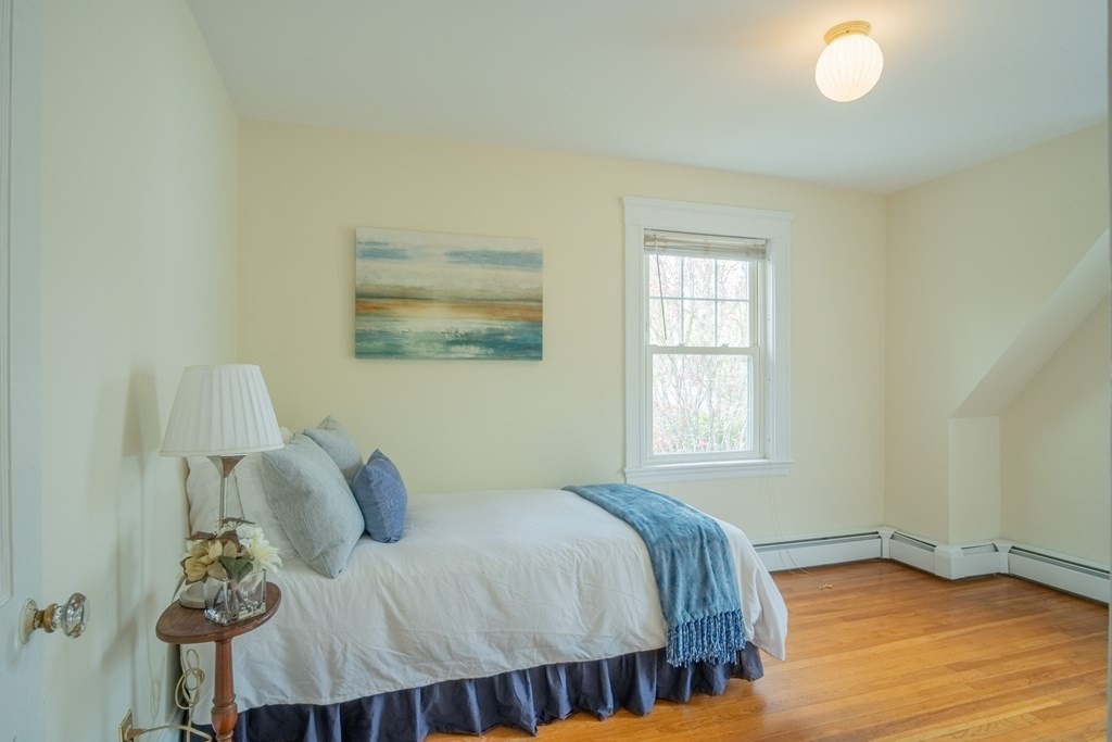 47 Pilgrim Road Marblehead, MA 01945 - Photo 18 of 42 a bedroom with a bed and a window