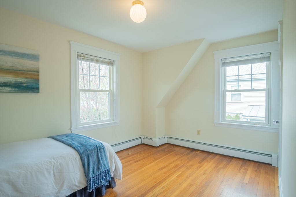 47 Pilgrim Road Marblehead, MA 01945 - Photo 19 of 42 a view of a room with wooden floor and windows