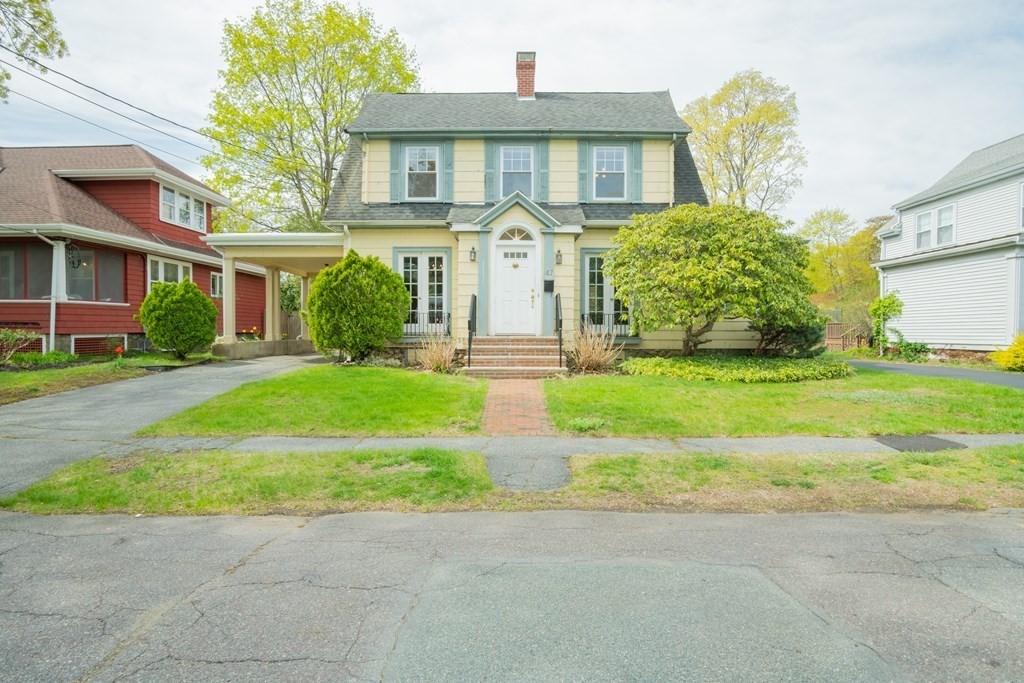 47 Pilgrim Road Marblehead, MA 01945 - Photo 2 of 42 a front view of a house with garden