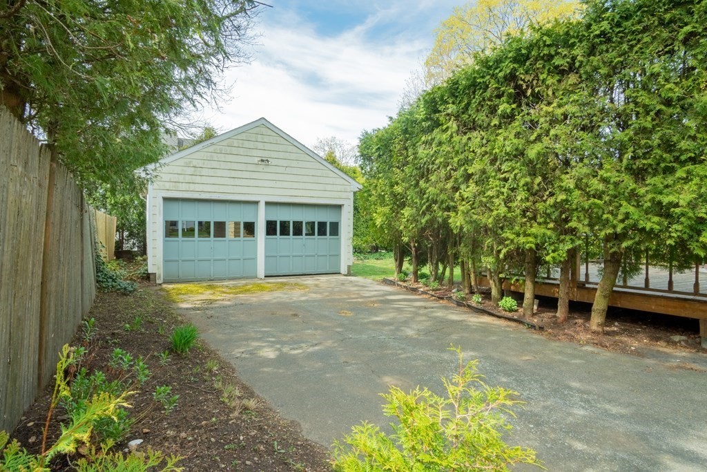 47 Pilgrim Road Marblehead, MA 01945 - Photo 34 of 42 a view of a house with a backyard and a patio