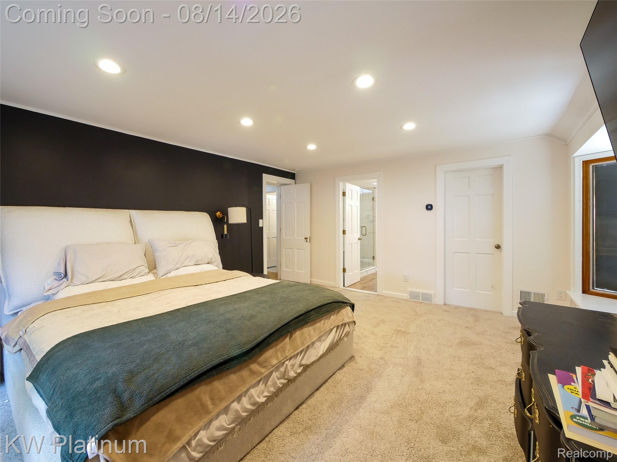 657 Hawthorne Road Grosse Pointe, MI 48236 - Photo 13 of 28 Recessed lighting, wall sconce, interior paneled doors, wood-frame window, and carpeting