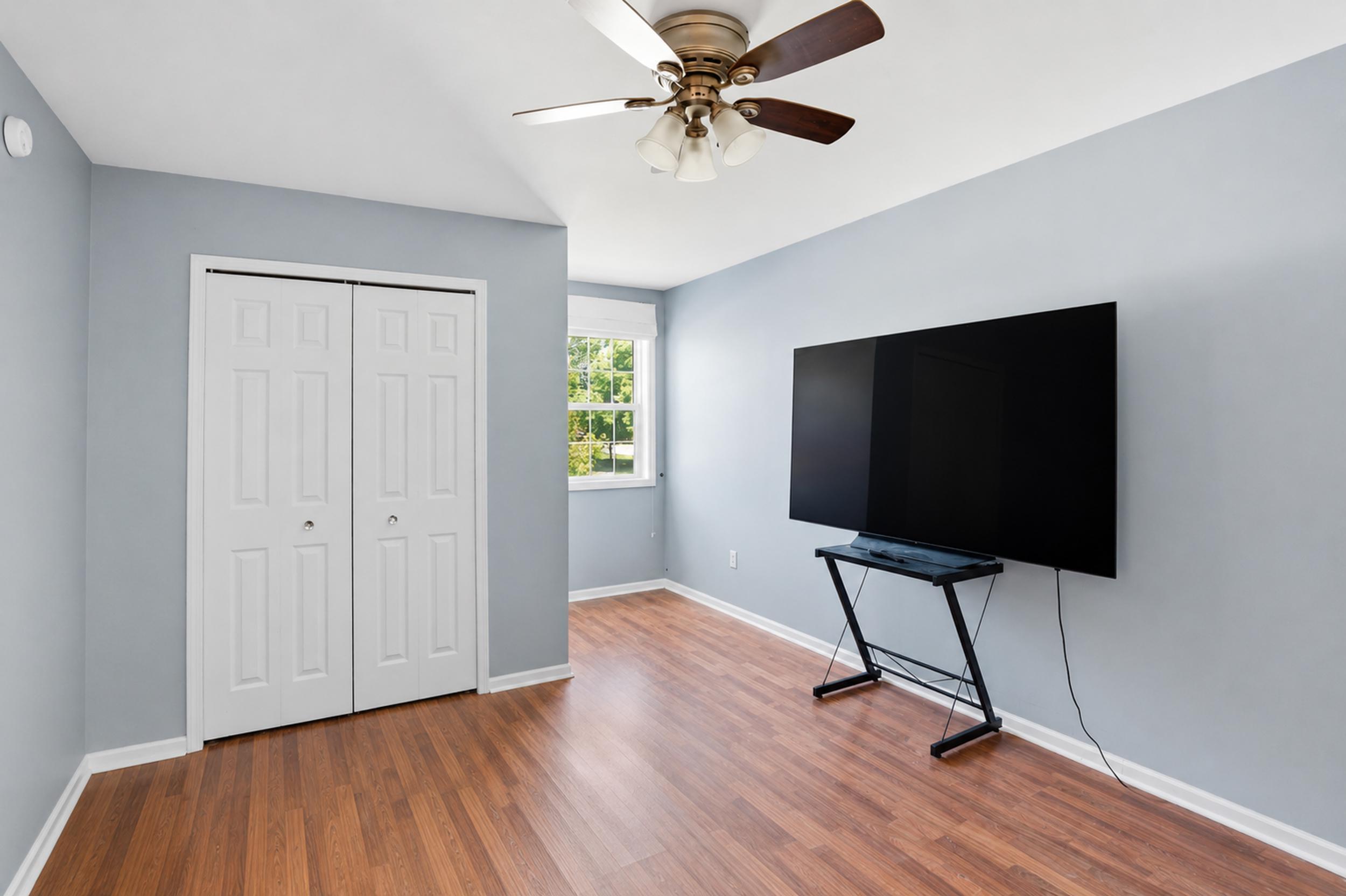 2184 Timberidge Lane Highland, IN 46322 - Photo 17 of 18 a view of room with wooden floor and ceiling fan