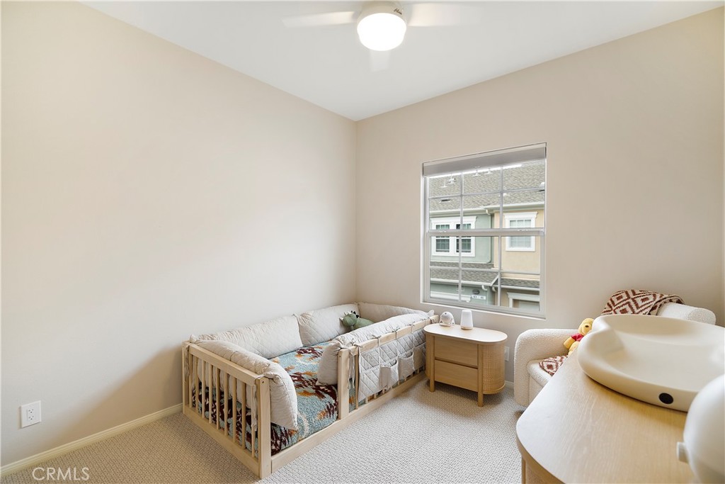 60 Strawflower Street Ladera Ranch, CA 92694 - Photo 14 of 34 a room with a bed and a window