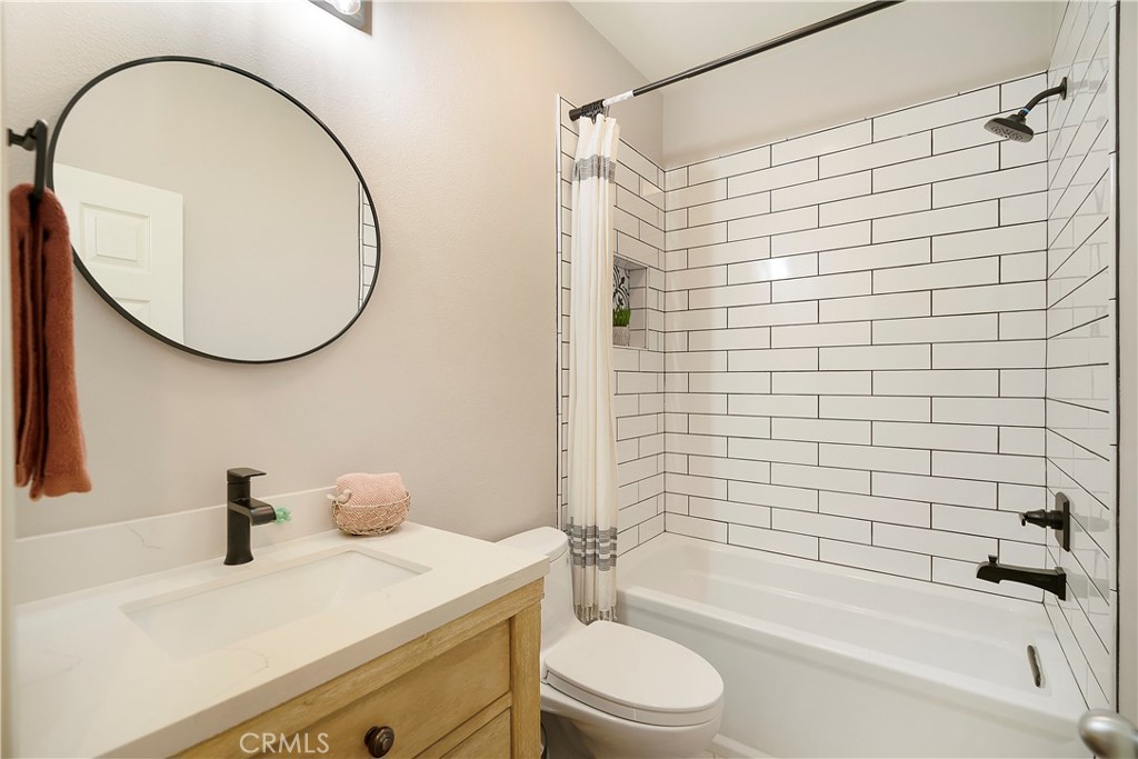 60 Strawflower Street Ladera Ranch, CA 92694 - Photo 15 of 34 a bathroom with a sink a toilet and a bathtub
