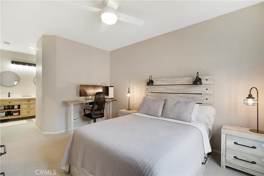 60 Strawflower Street Ladera Ranch, CA 92694 - Photo 17 of 34 a bedroom with a bed and furniture