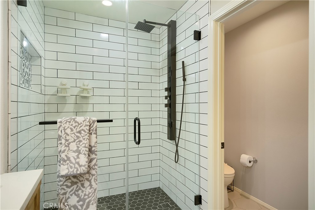 60 Strawflower Street Ladera Ranch, CA 92694 - Photo 19 of 34 a bathroom with a shower