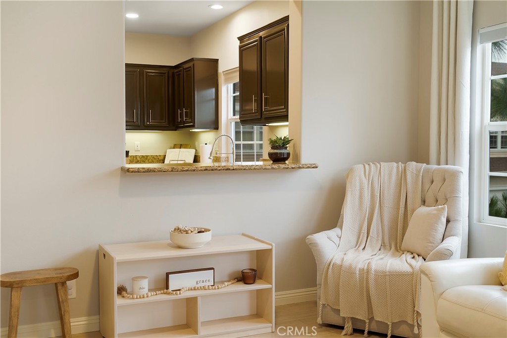 60 Strawflower Street Ladera Ranch, CA 92694 - Photo 25 of 34 a living room with furniture and a window