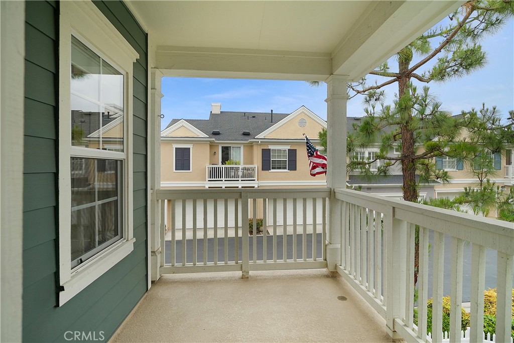 60 Strawflower Street Ladera Ranch, CA 92694 - Photo 26 of 34 a view of a house with a small yard and wooden floor and fence