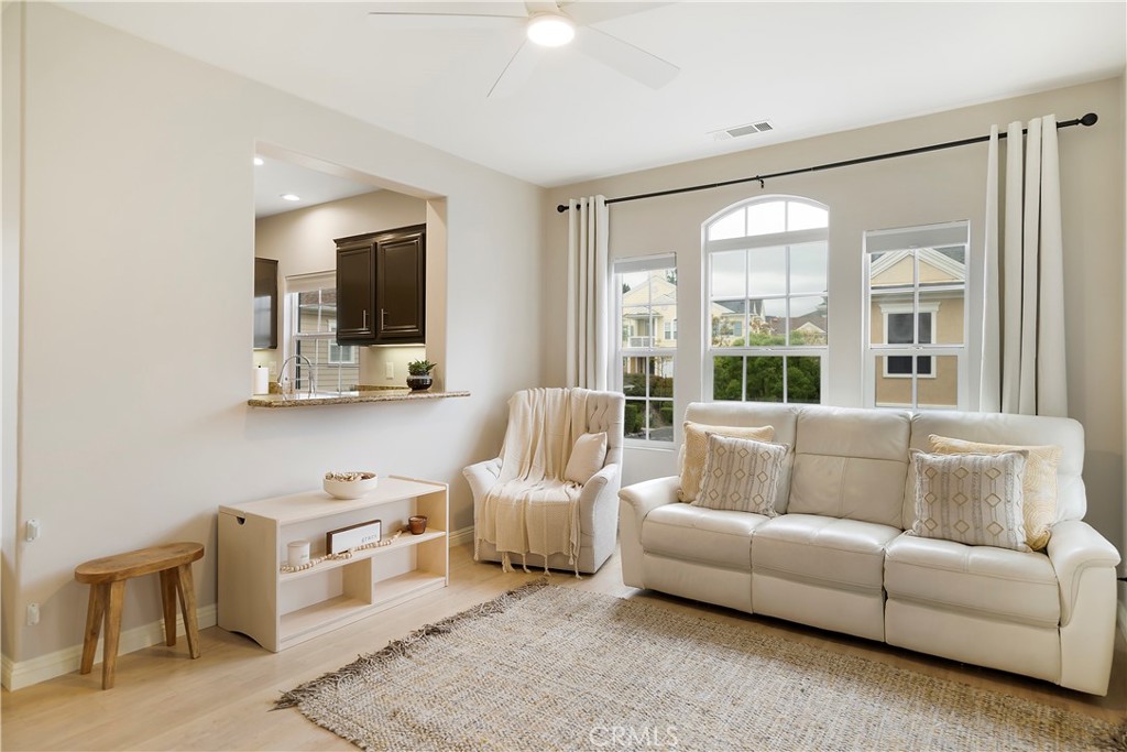 60 Strawflower Street Ladera Ranch, CA 92694 - Photo 5 of 34 a living room with furniture and a large window