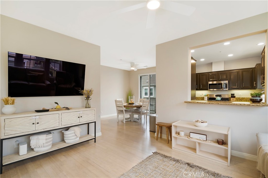60 Strawflower Street Ladera Ranch, CA 92694 - Photo 6 of 34 a living room with furniture and a flat screen tv