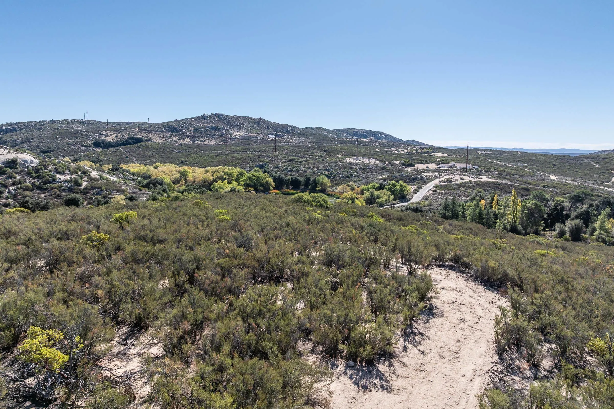 35956 Stagecoach Springs Road, Unit 278 Pine Valley, CA 91962 - Photo 2 of 16 a view of a city with mountains in the background