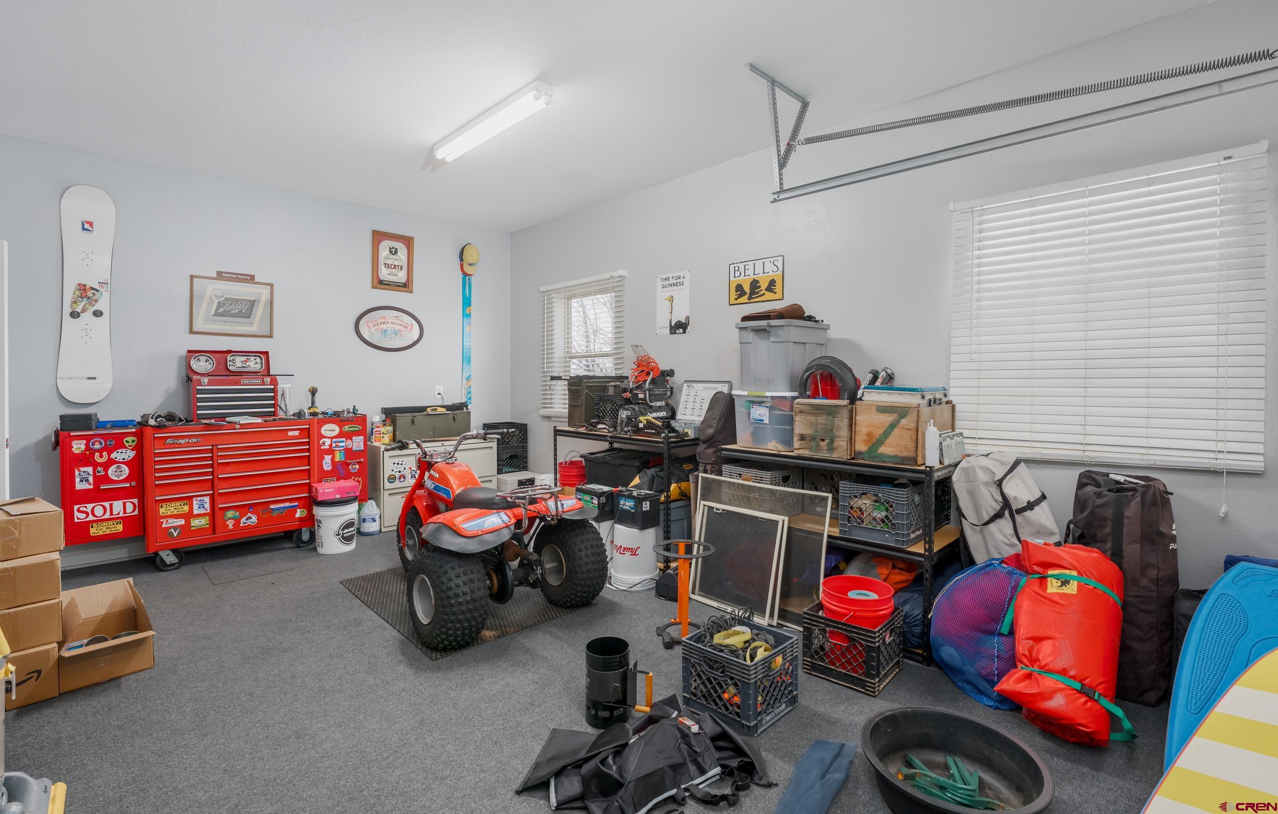 517 Dove Ranch Road Bayfield, CO 81122 - Photo 16 of 29 a living room with furniture and a gym machine