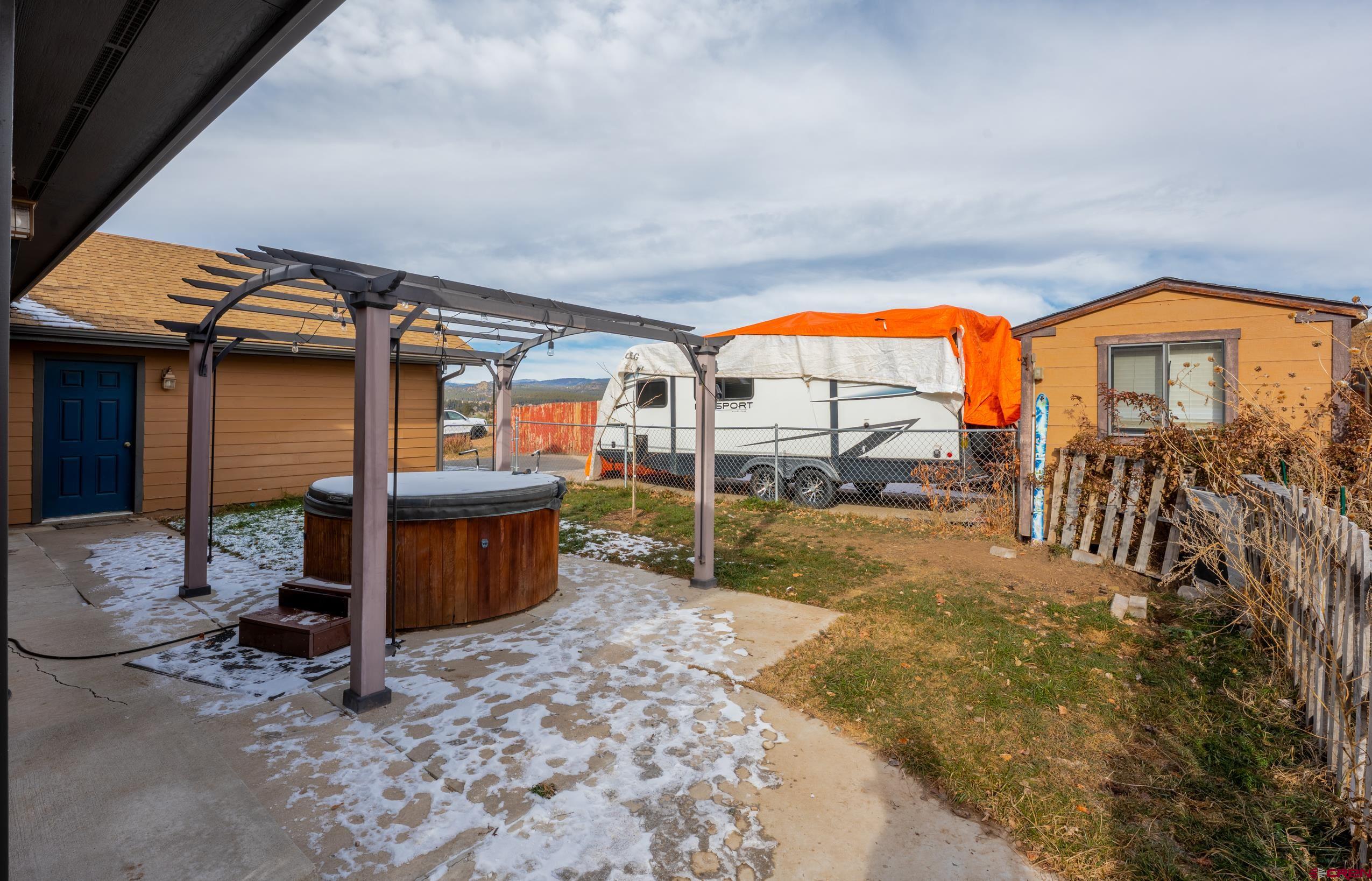 517 Dove Ranch Road Bayfield, CO 81122 - Photo 23 of 29 a view of swimming pool with a patio