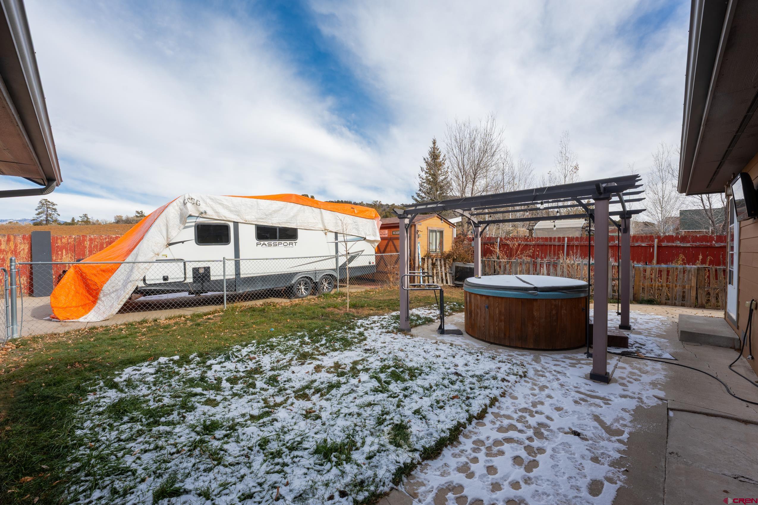 517 Dove Ranch Road Bayfield, CO 81122 - Photo 24 of 29 a view of a house with a backyard