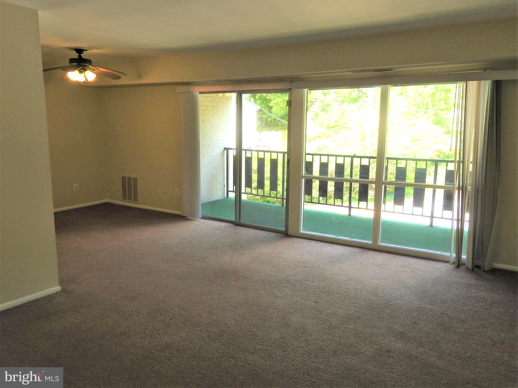 3120 Brinkley Road, Unit 3304 Temple Hills, MD 20748 - Photo 2 of 18 Main Living space with large balcony.