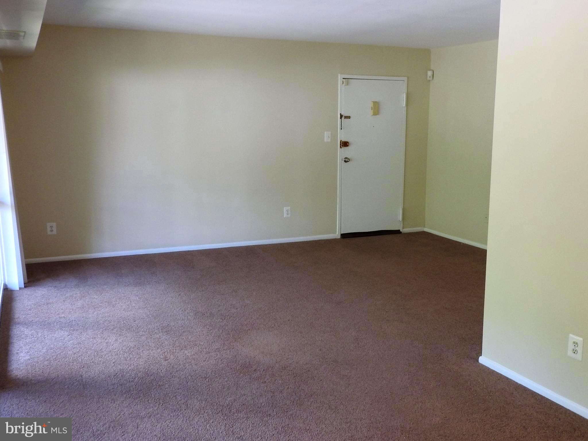 3120 Brinkley Road, Unit 3304 Temple Hills, MD 20748 - Photo 5 of 18 Looking to front door from dining area.