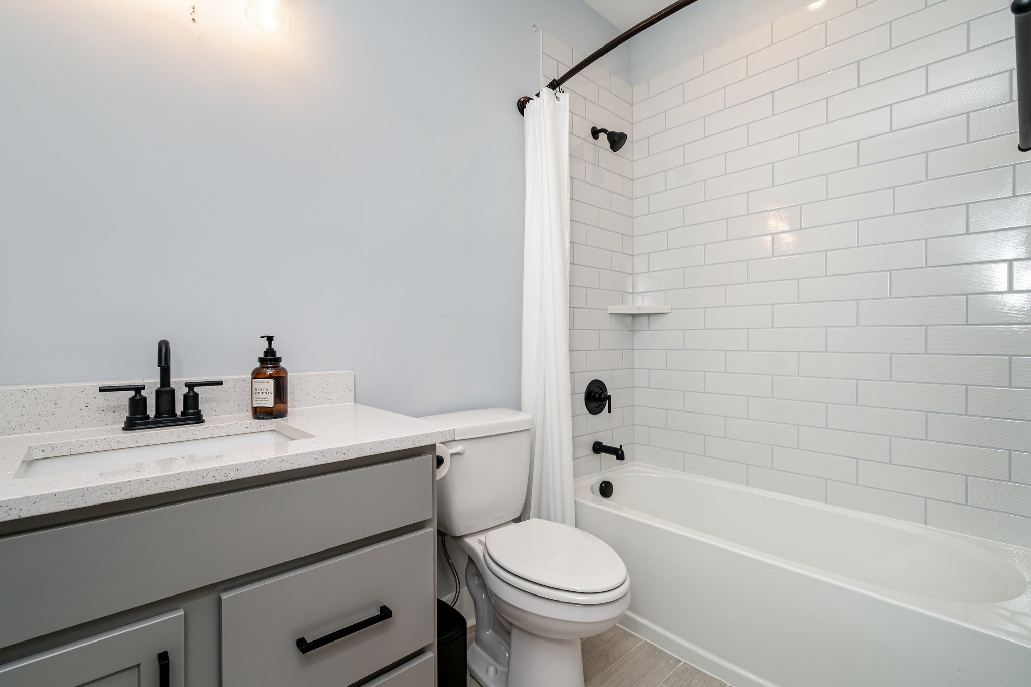3427 Earhart Road Mount Juliet, TN 37122 - Photo 13 of 26 a bathroom with a sink toilet vanity and bathtub