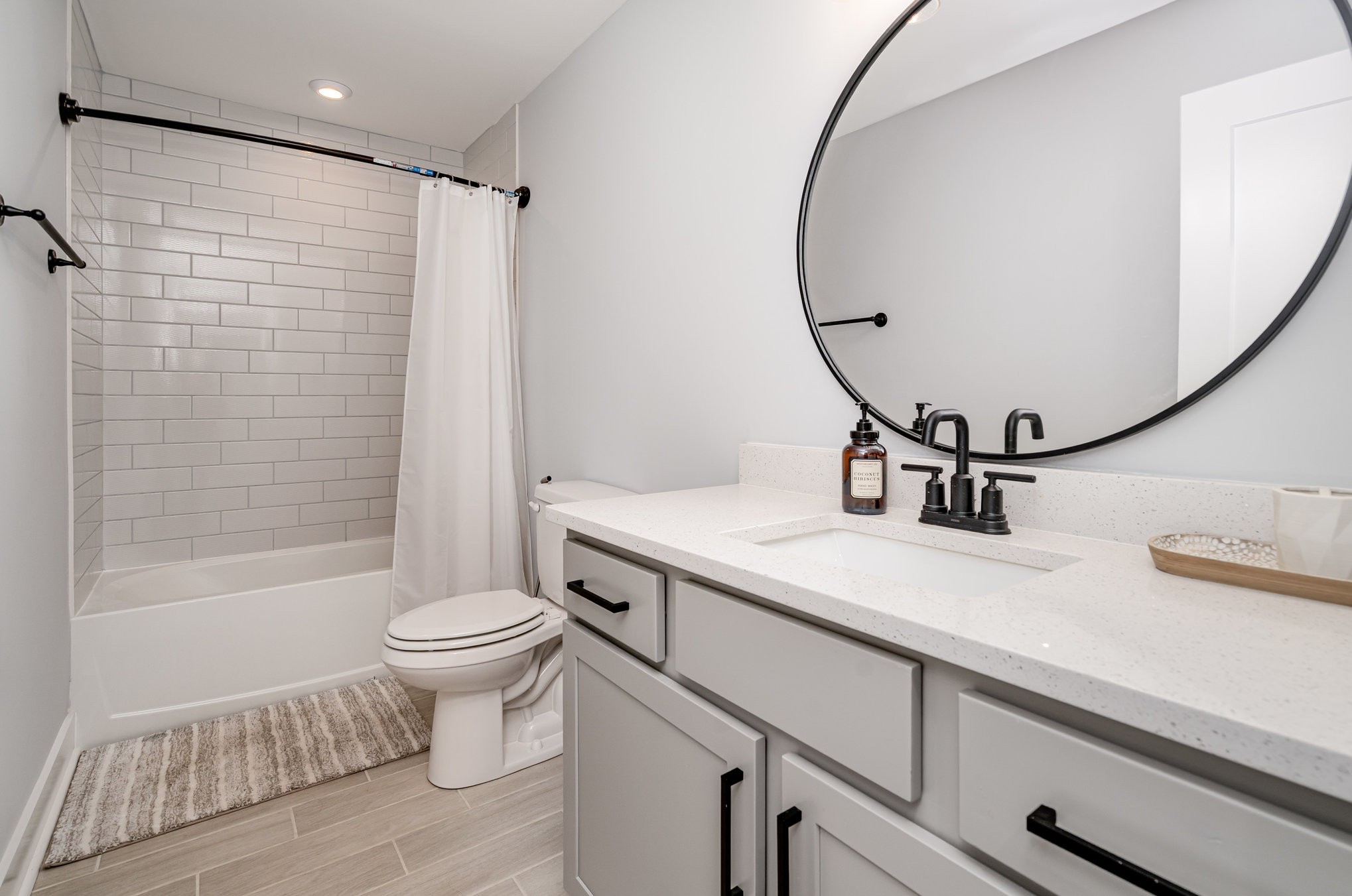 3427 Earhart Road Mount Juliet, TN 37122 - Photo 14 of 26 a bathroom with a sink a toilet and shower