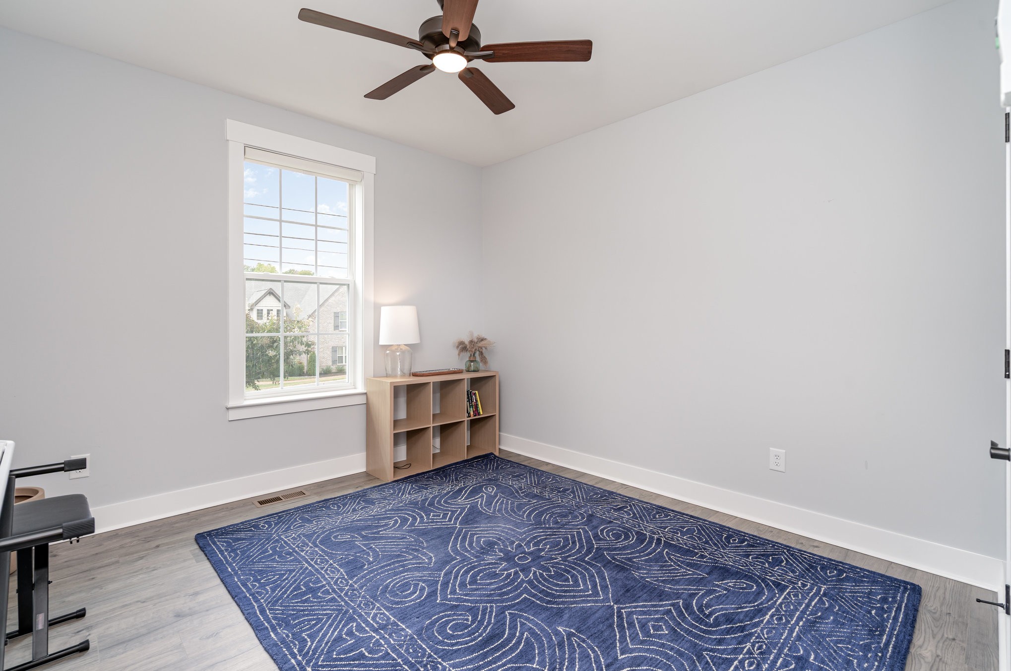 3427 Earhart Road Mount Juliet, TN 37122 - Photo 15 of 26 wooden floor in an empty room with a window