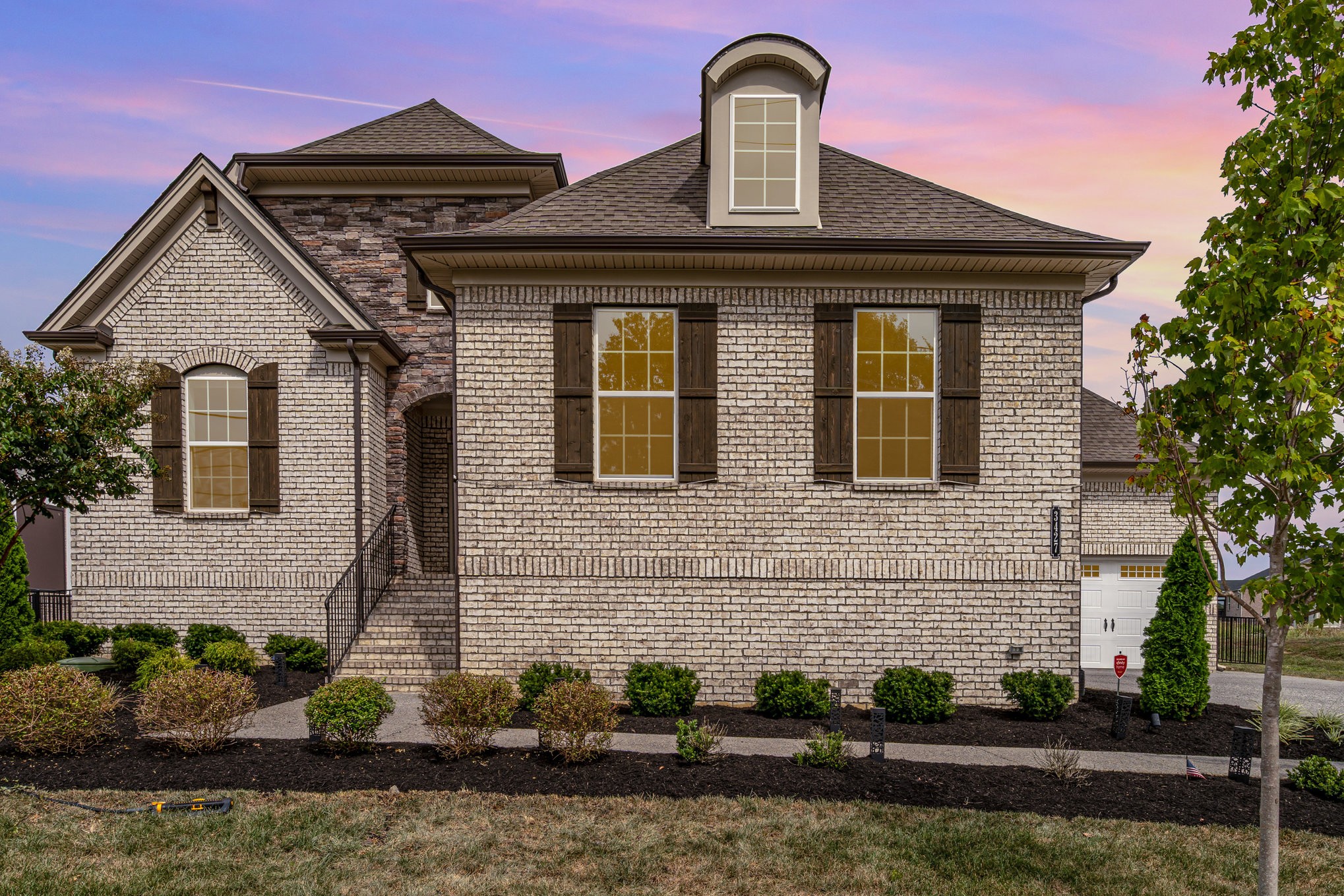 3427 Earhart Road Mount Juliet, TN 37122 - Photo 23 of 26 a front view of a house with a yard