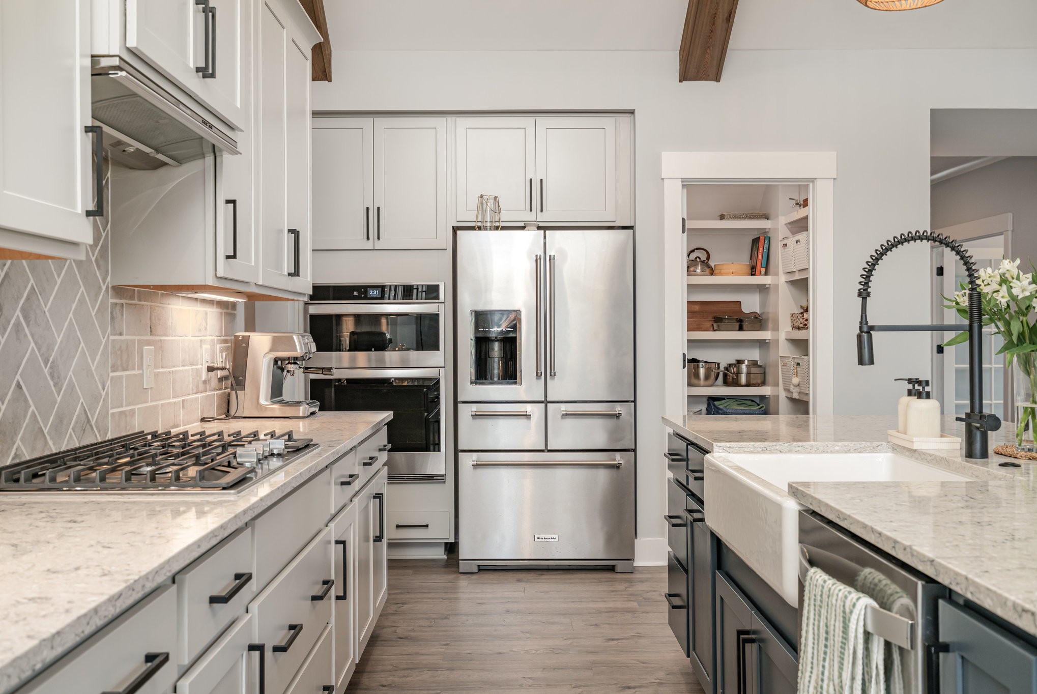 3427 Earhart Road Mount Juliet, TN 37122 - Photo 6 of 26 a kitchen with a refrigerator and a sink
