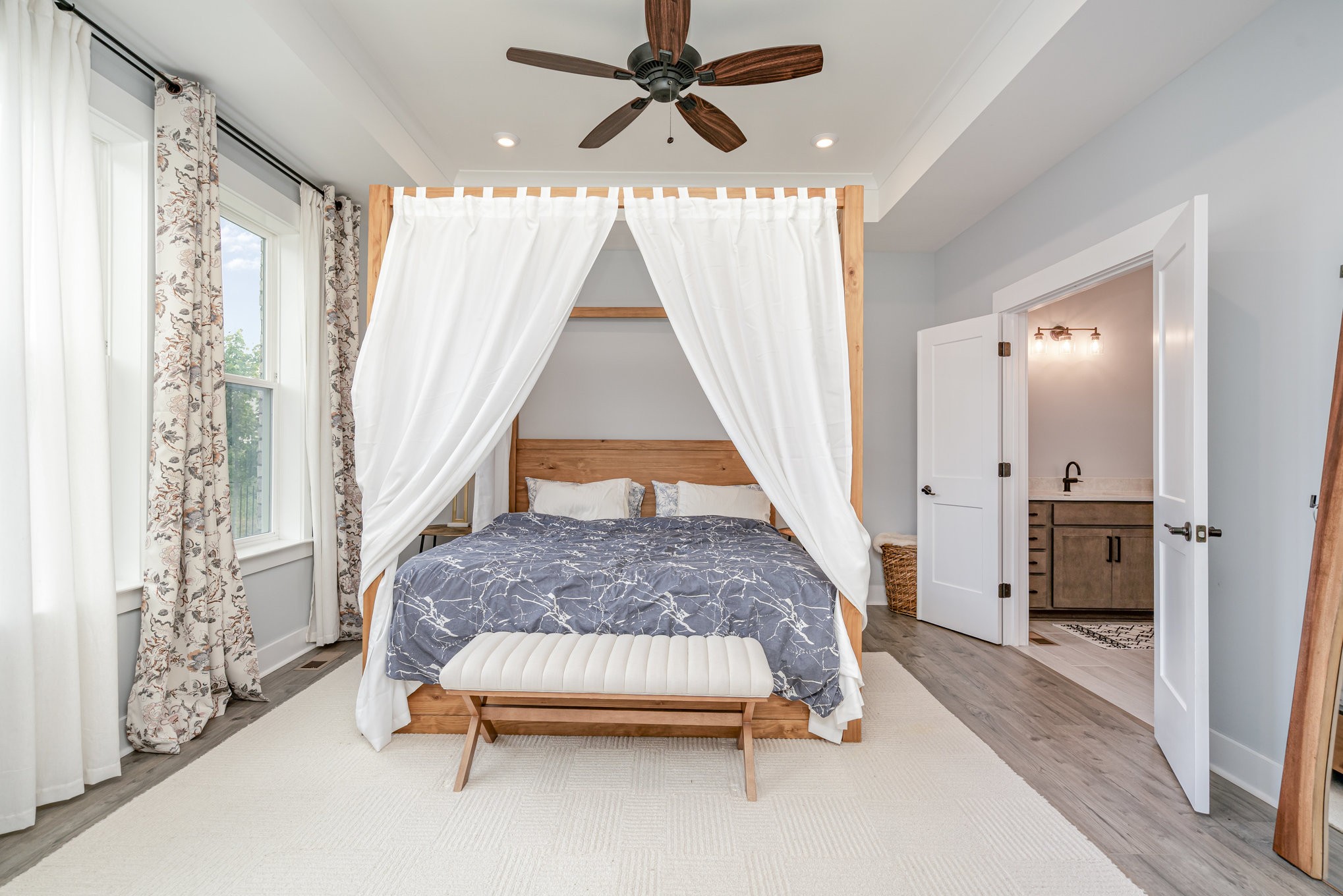 3427 Earhart Road Mount Juliet, TN 37122 - Photo 9 of 26 a bedroom with a bed and a chandelier