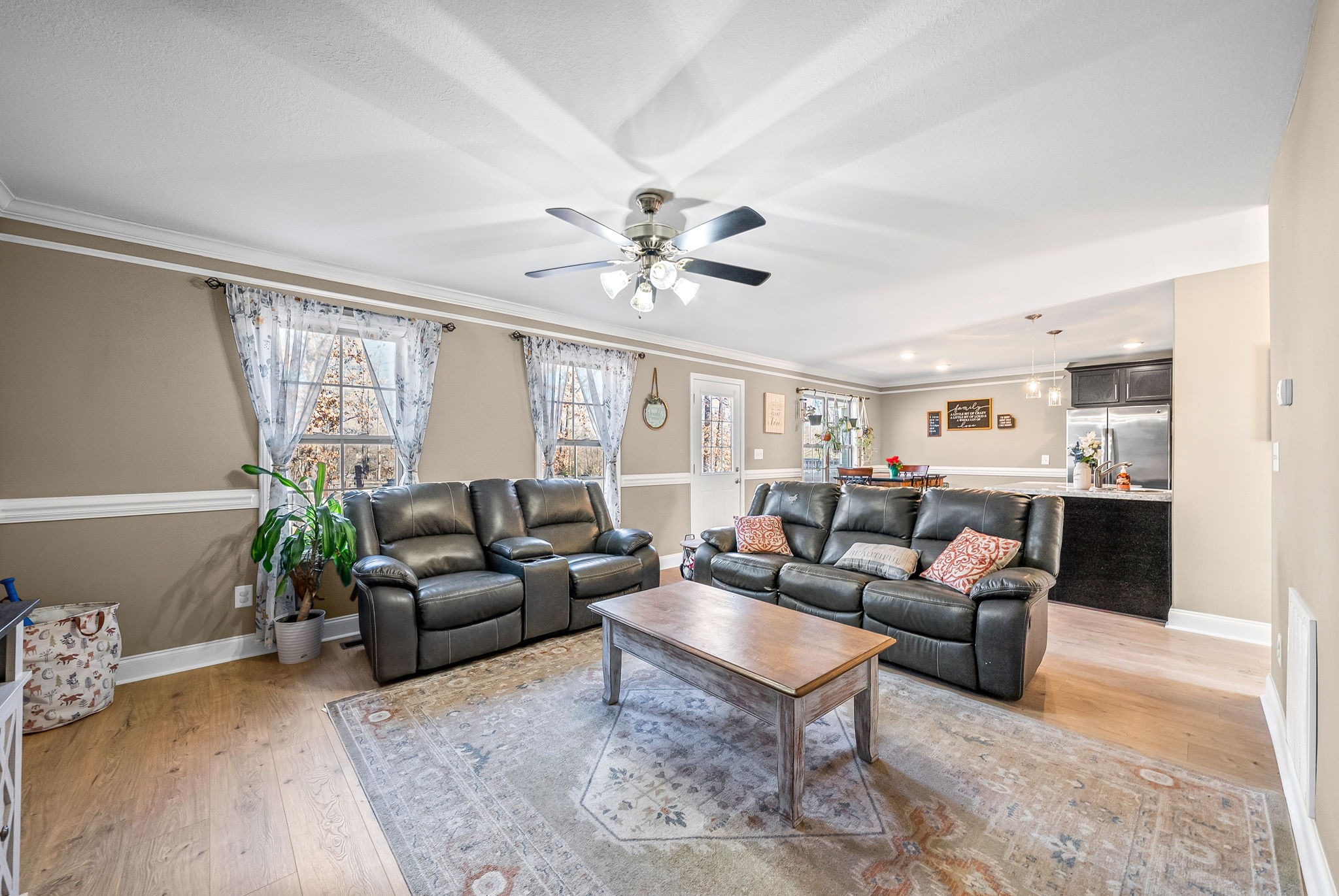 548 Medallion Circle Clarksville, TN 37042 - Photo 11 of 40 a living room with furniture and a large window