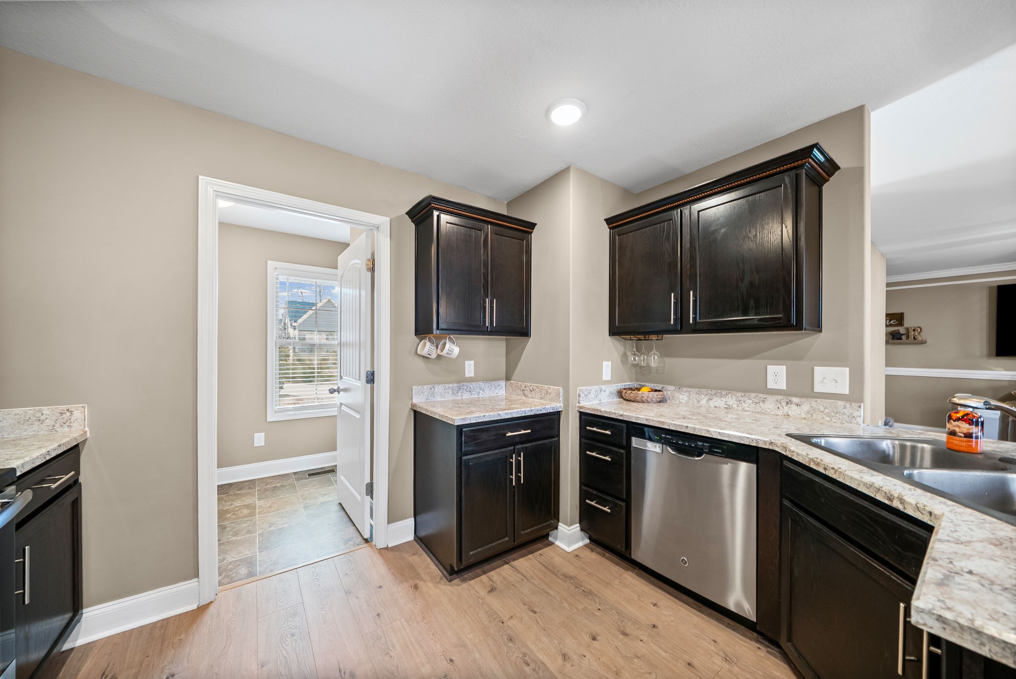 548 Medallion Circle Clarksville, TN 37042 - Photo 15 of 40 a kitchen with stainless steel appliances granite countertop a sink and a stove top oven