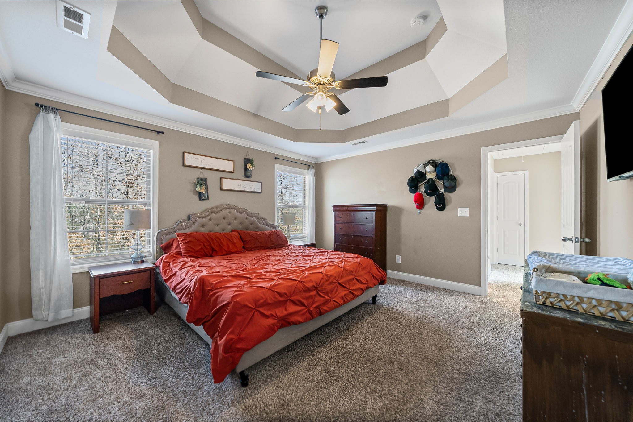 548 Medallion Circle Clarksville, TN 37042 - Photo 21 of 40 a bed room with a bed and a chandelier