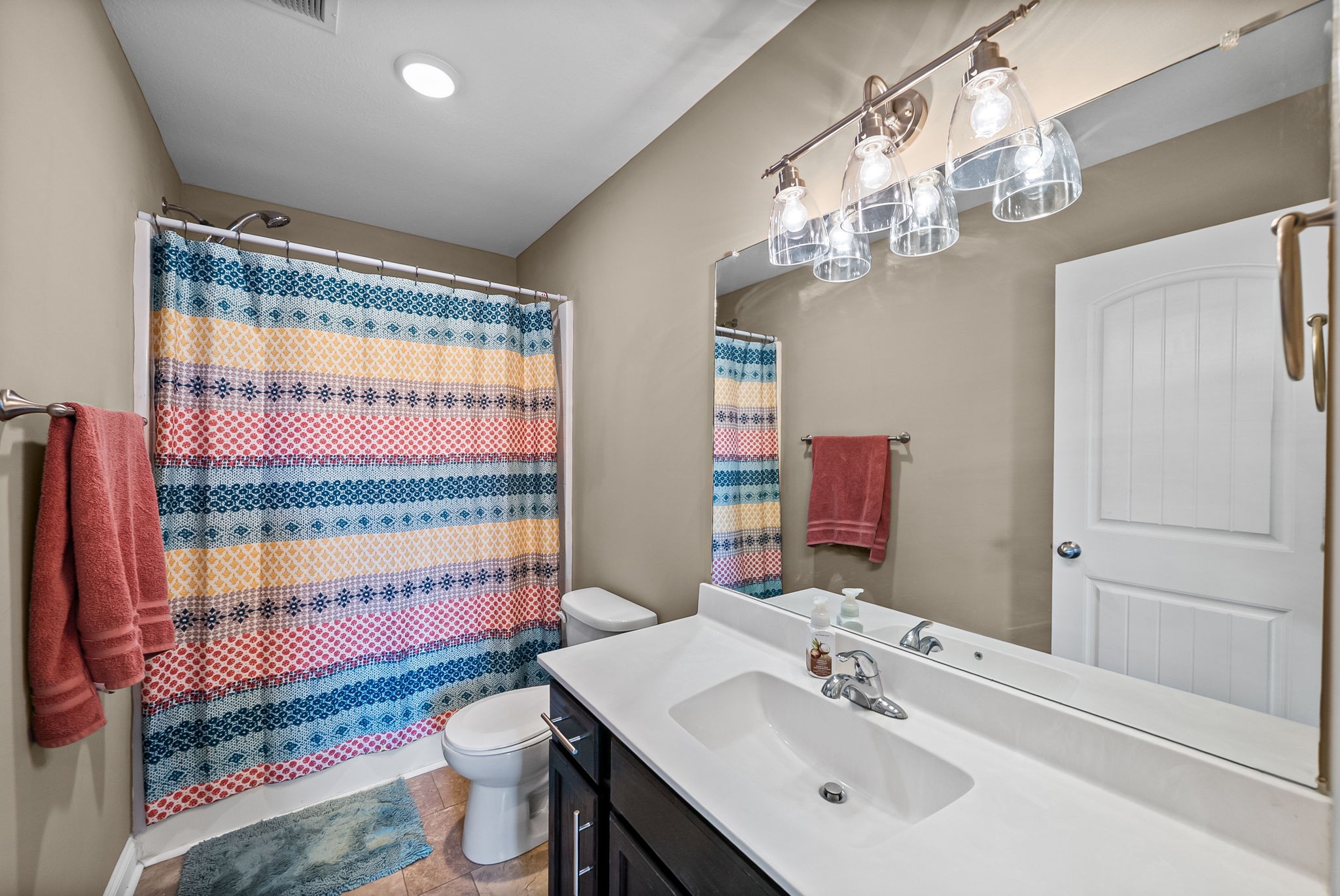 548 Medallion Circle Clarksville, TN 37042 - Photo 24 of 40 a bathroom with a sink a toilet and a mirror