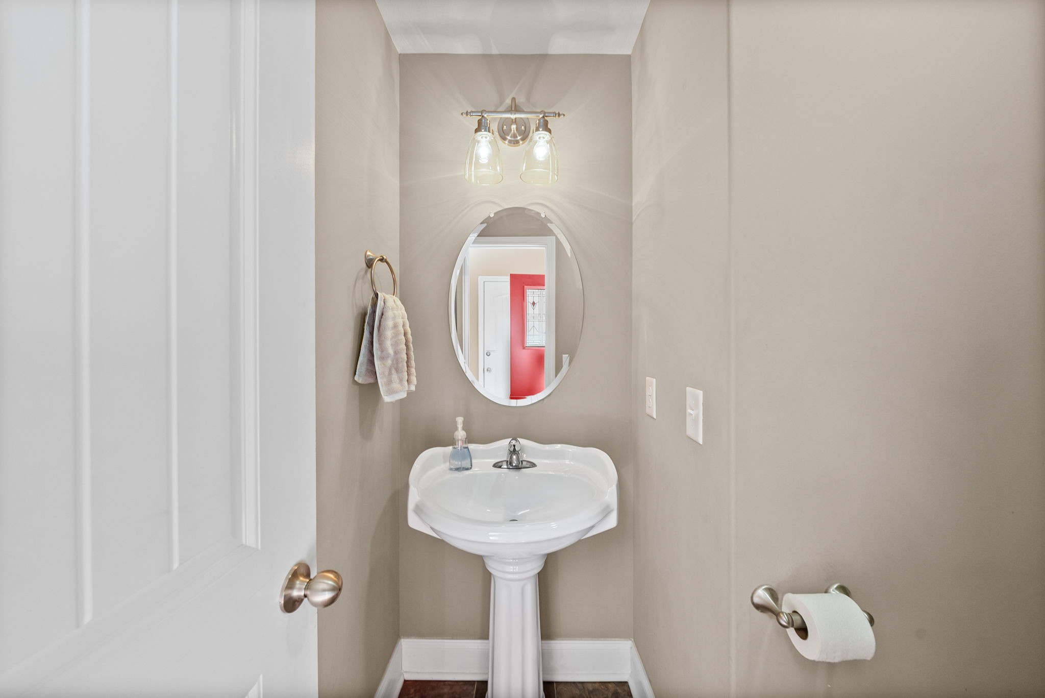 548 Medallion Circle Clarksville, TN 37042 - Photo 8 of 40 a bathroom with a sink a mirror and a light fixture