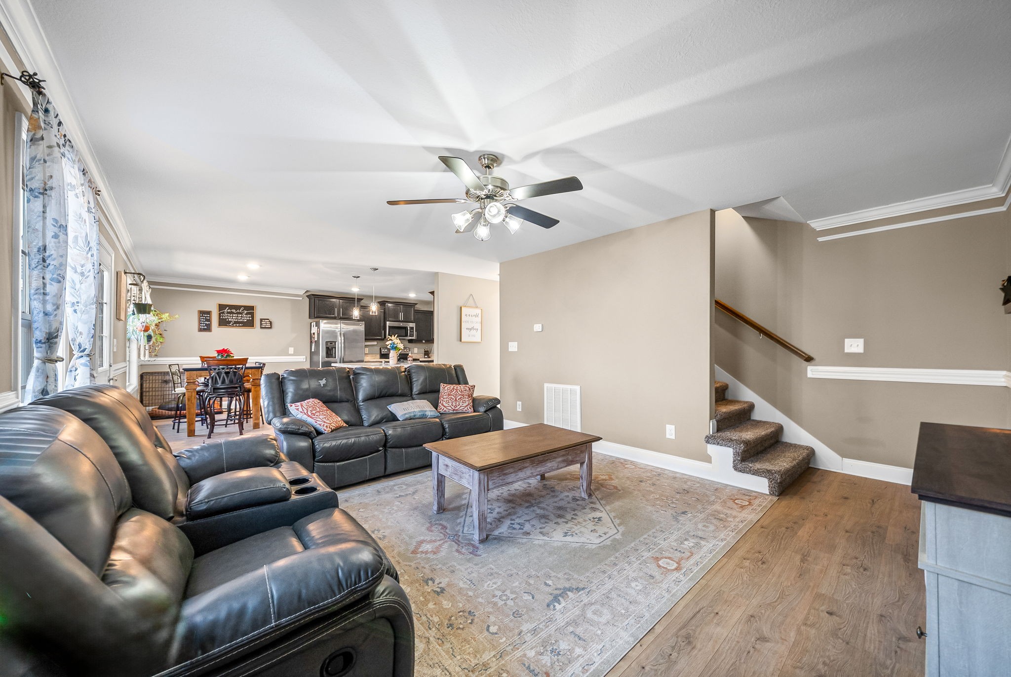 548 Medallion Circle Clarksville, TN 37042 - Photo 10 of 40 a living room with furniture and a ceiling fan