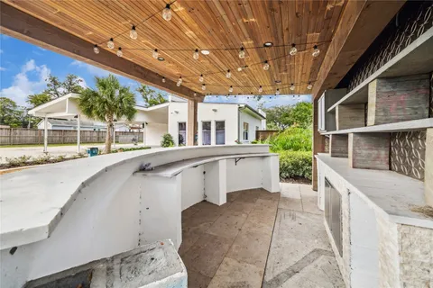 a house with trees in the background