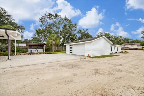 a house with trees in the background