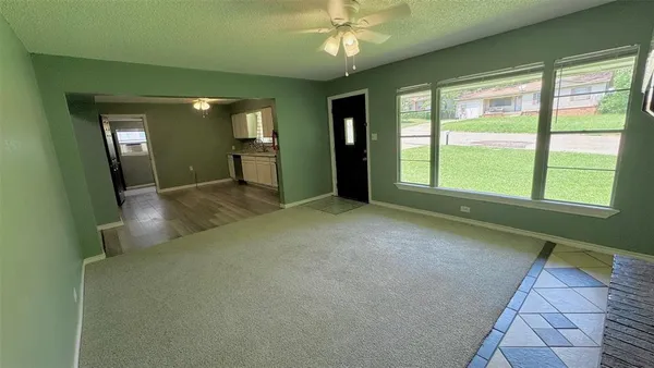 a kitchen with stainless steel appliances granite countertop a stove and a sink