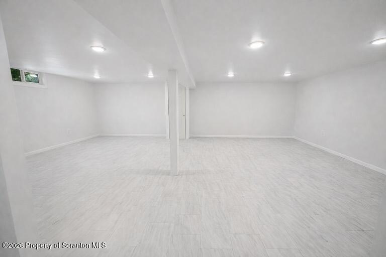1125 Watson Street Scranton, PA 18504 - Photo 12 of 20 an empty room with a empty space and windows