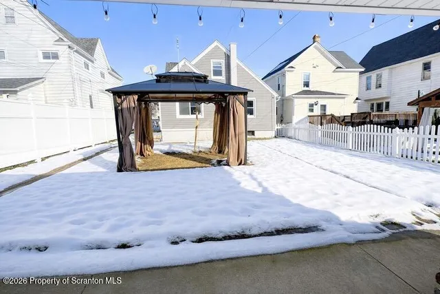 a view of a living room and kitchen