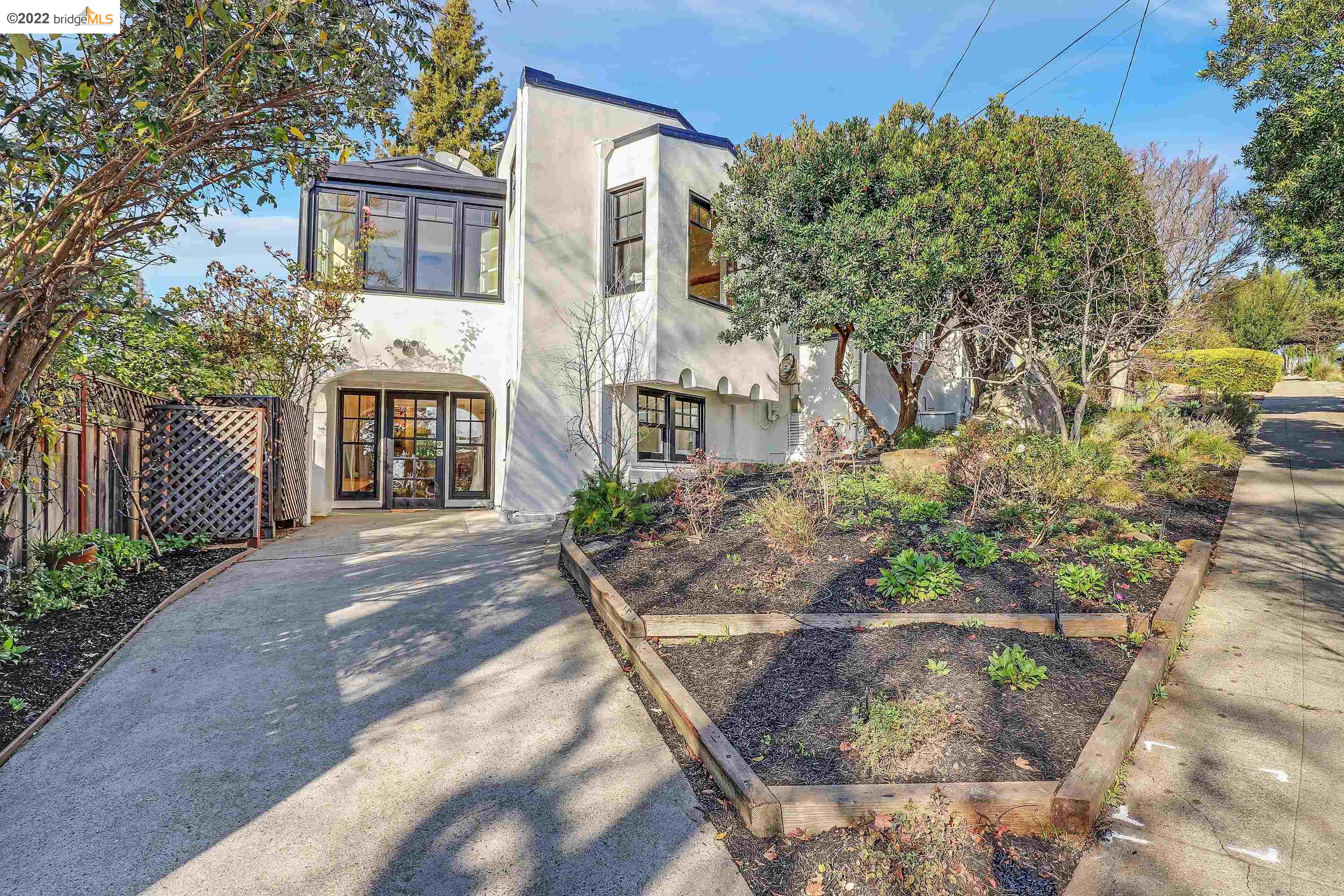 3129 Madera Avenue Oakland, CA 94619 - Photo 1 of 1 a view of a house with a yard and potted plants
