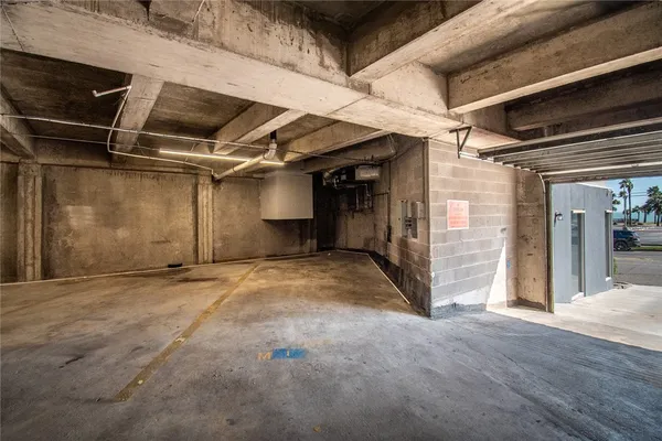 a view of empty room with wooden walls